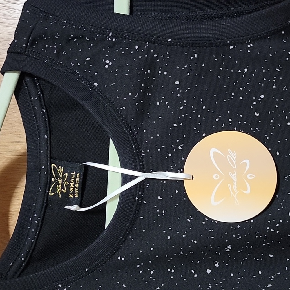 Laila Ali Sleeveless shirt. Speckled shirt with tie to adjust length on side - Picture 2 of 4